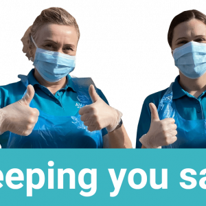 keeping_you_safe Avanti Homecare staff demonstrating the PPE, including Aprons masks and gloves they are wearing to keep people safe.